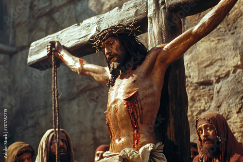 scene of Jesus being crucified on the cross photo