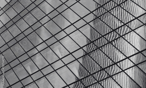 A fragment of a modern skyscraper in black and white in the business center of Moscow City.