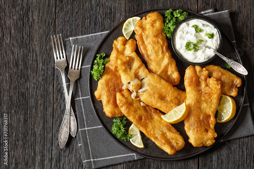 Photography deep fried crispy beer batter fish fillet on plate