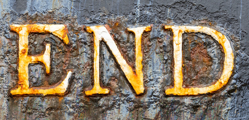 'END' in an old cast iron surface
