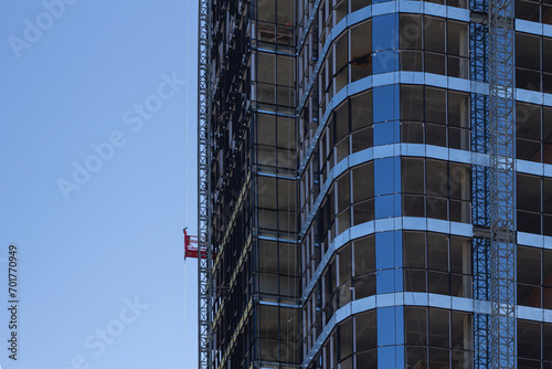 Construction of a multi-storey building. Reinforcement of reinforced concrete columns. Construction of high-rise buildings.. Modern homes. glass and concrete. Business center. financing. lease.