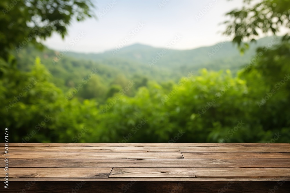 an empty wooden table against a backdrop of lush green nature