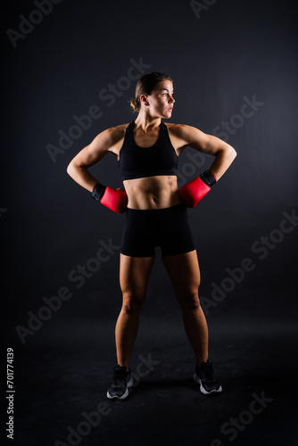 Young woman athletic female MMA fighter training. Concept of sport, action, healthy lifestyle. © Ivan Zelenin