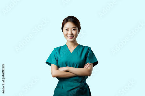 Asian nurse smiling with arms folded