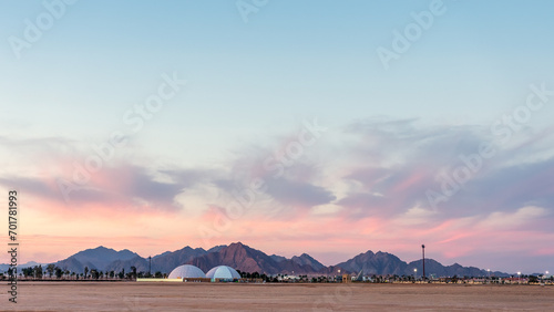Desert with mountains during sunset in Egypt. photo