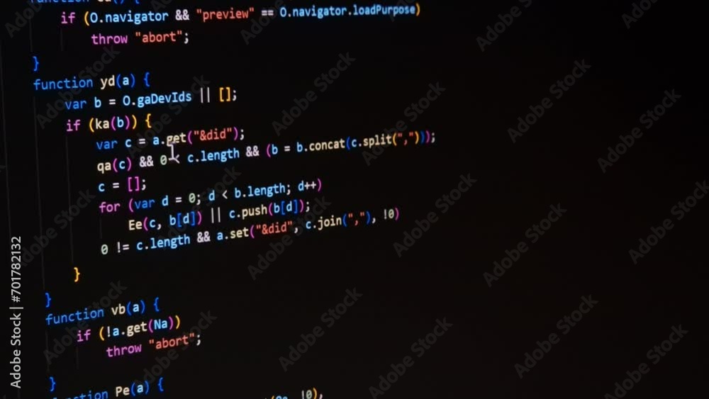 Code. Colorful jsx javascript computer programming code scroll close up pixel detail shot 4K super macro on screen.