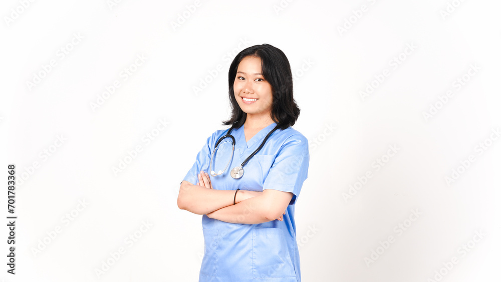 Young Asian female doctor folding arms smiling and looking at camera isolated on white background Young Asian female doctor folding arms smiling and looking at camera isolated on white background