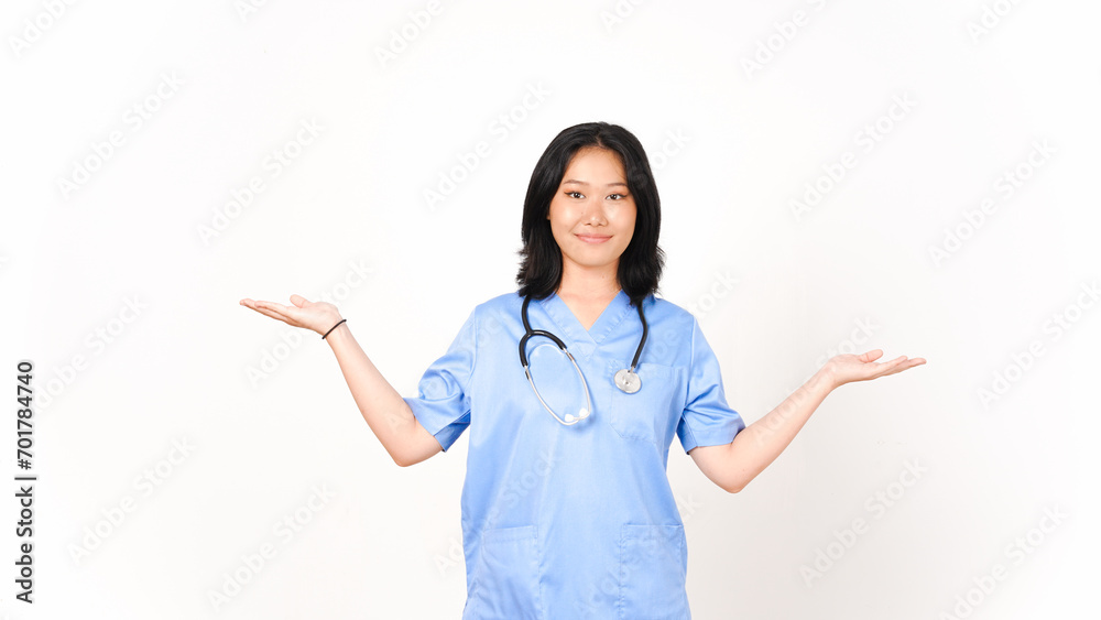 Young Asian female doctor showing copy space on two open palm isolated on white background Young Asian female doctor showing copy space on two open palm isolated on white background