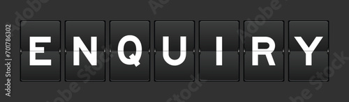 Black color analog flip board with word enquiry on gray background