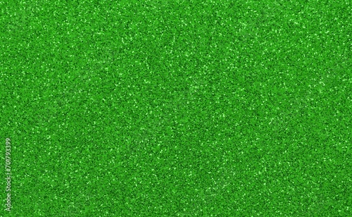 background of glitterd material of color GREEN ideal as backdrop
