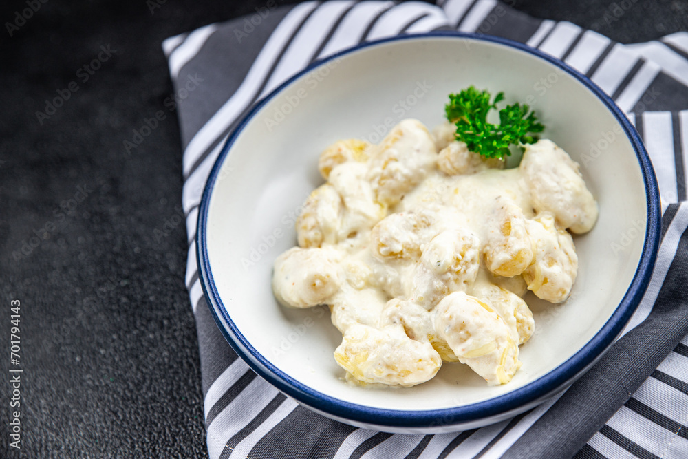 gnocchi cheese sauce potato dough fresh healthy eating cooking appetizer meal food snack on the table copy space food background rustic top view