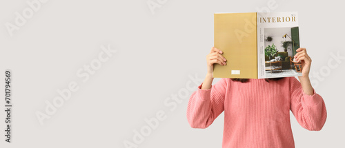 Beautiful woman reading int...