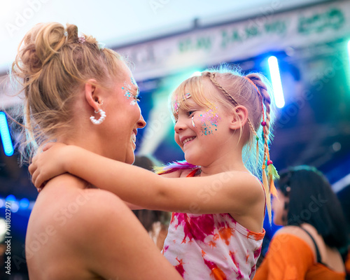 Принти на полотні Mother With Daughter Wearing Glitter Having Fun At Outdoor Summer Music Festival