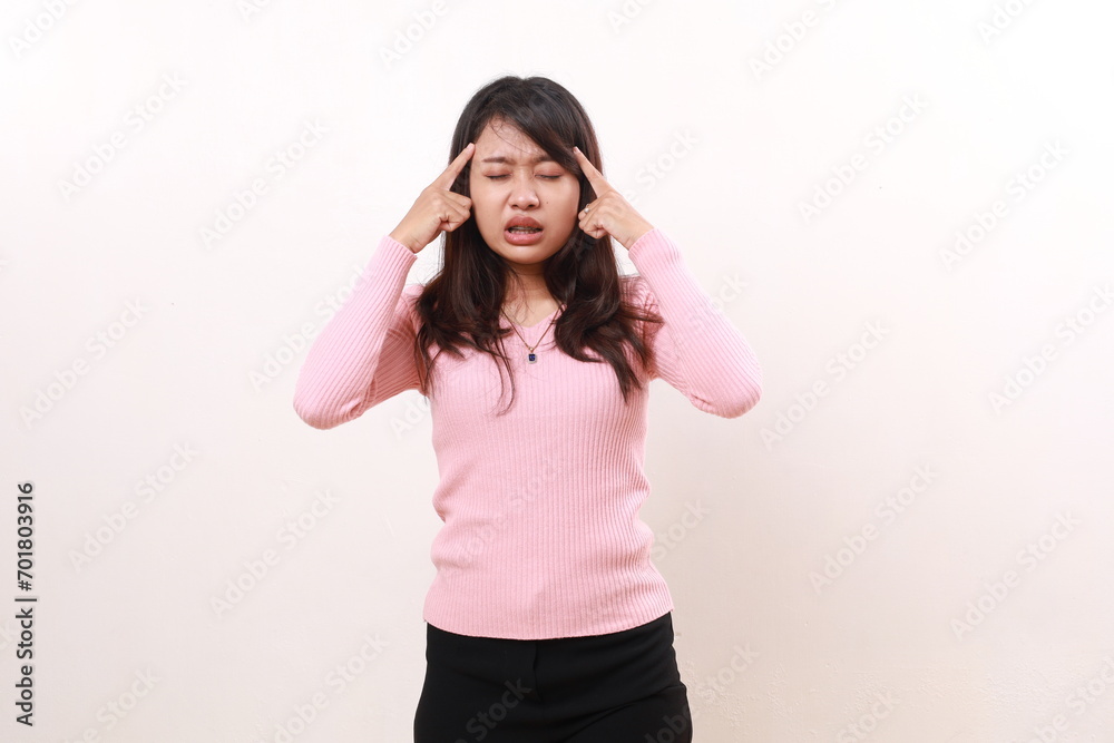 Young asian girl suffering from headache. Hands holds head. Isolated on white Young asian girl suffering from headache. Hands holds head. Isolated on white