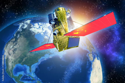 Fototapeta Naklejka Na Ścianę i Meble -  Chinese space satellite. Spaceship over planet earth. Flying satellite with Chinese flag. PRC space program. Satellite of Chinese telecommunications company. 3d image planet earth, elements from nasa