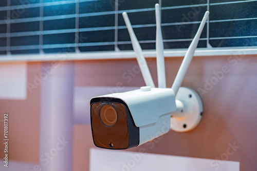 WIFI camera hangs on wall. ...