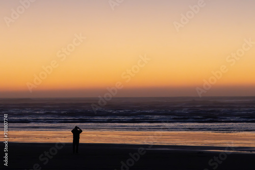 People watching the sunset along the beach © CLShebley