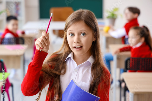 Little schoolgirl with copy...