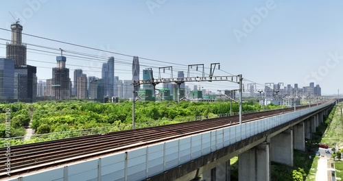 high speed train through elevated railtrack photo