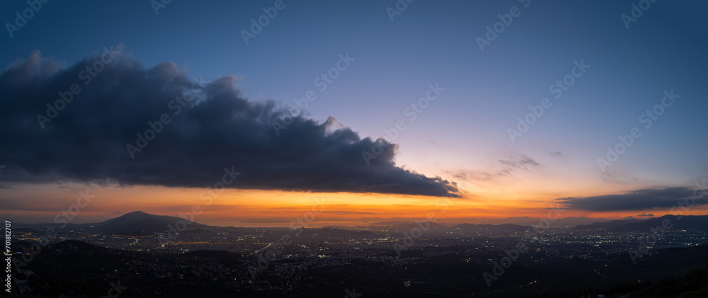 Panorama of cloud after sunset over the city