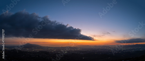 Panorama of cloud after sunset over the city
