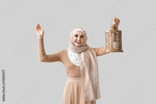 Young Muslim woman with lan...