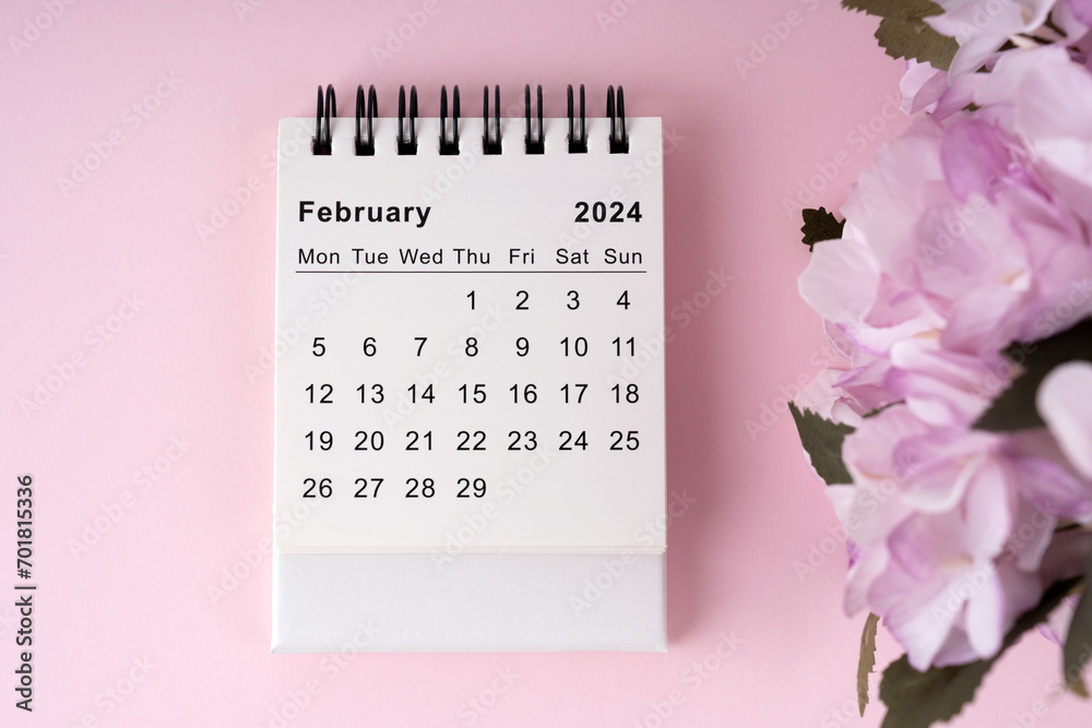 February 2024 desk calendar on pink background flat lay - obrazy, fototapety, plakaty 