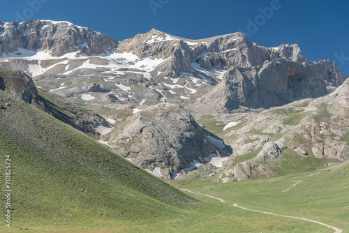 Bolkar mountains from various angles green colored nature flowing water lakes cloudy sky and steep sharp rock forms photo