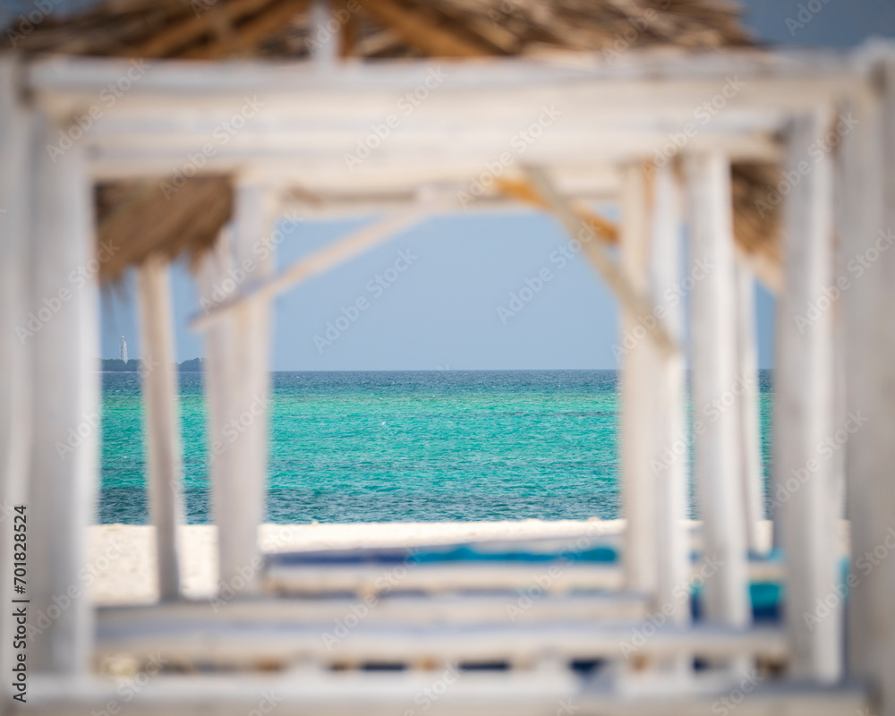 Seascape view background from wooden frame on the beach, summer concept, wonderful landscape nature view, luxury resort.