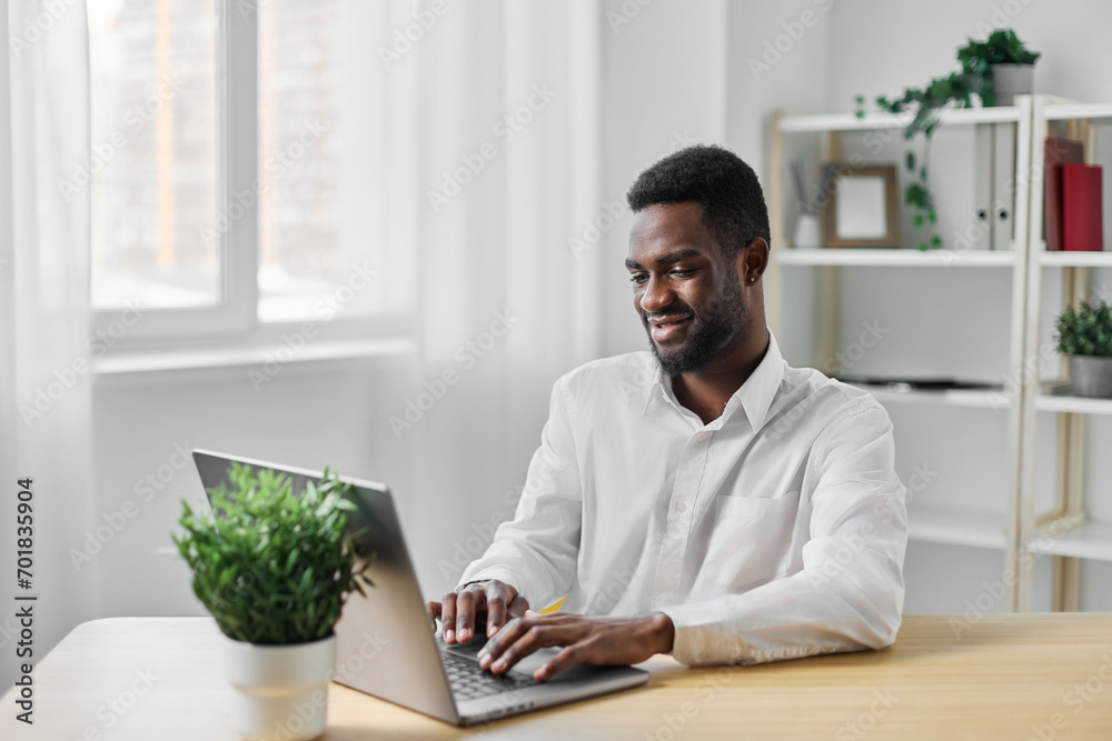man online job american office freelancer student computer african education laptop businessman man online job american office freelancer student computer african education laptop businessman