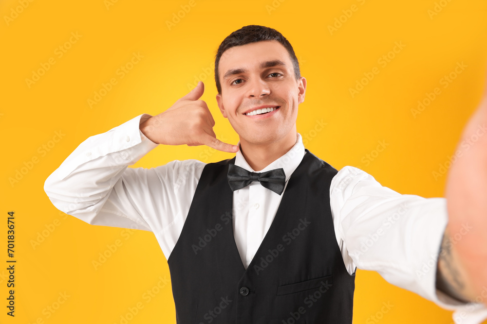 Male waiter showing Male waiter showing