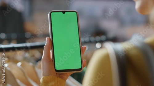 Wallpaper Mural Customer lady scrolling chromakey smartphone mall closeup. Shopaholic browsing Torontodigital.ca