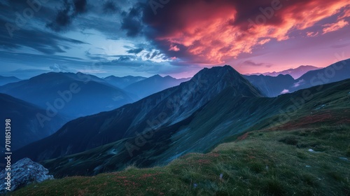 An impressive landscape photograph capturing mountains, vivid colors, dramatic lighting, a wide-angle viewpoint, exceptional exposure, and a dynamic twilight sky.