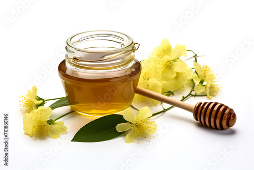 Honey in glass jar and dipper on white background with flowers