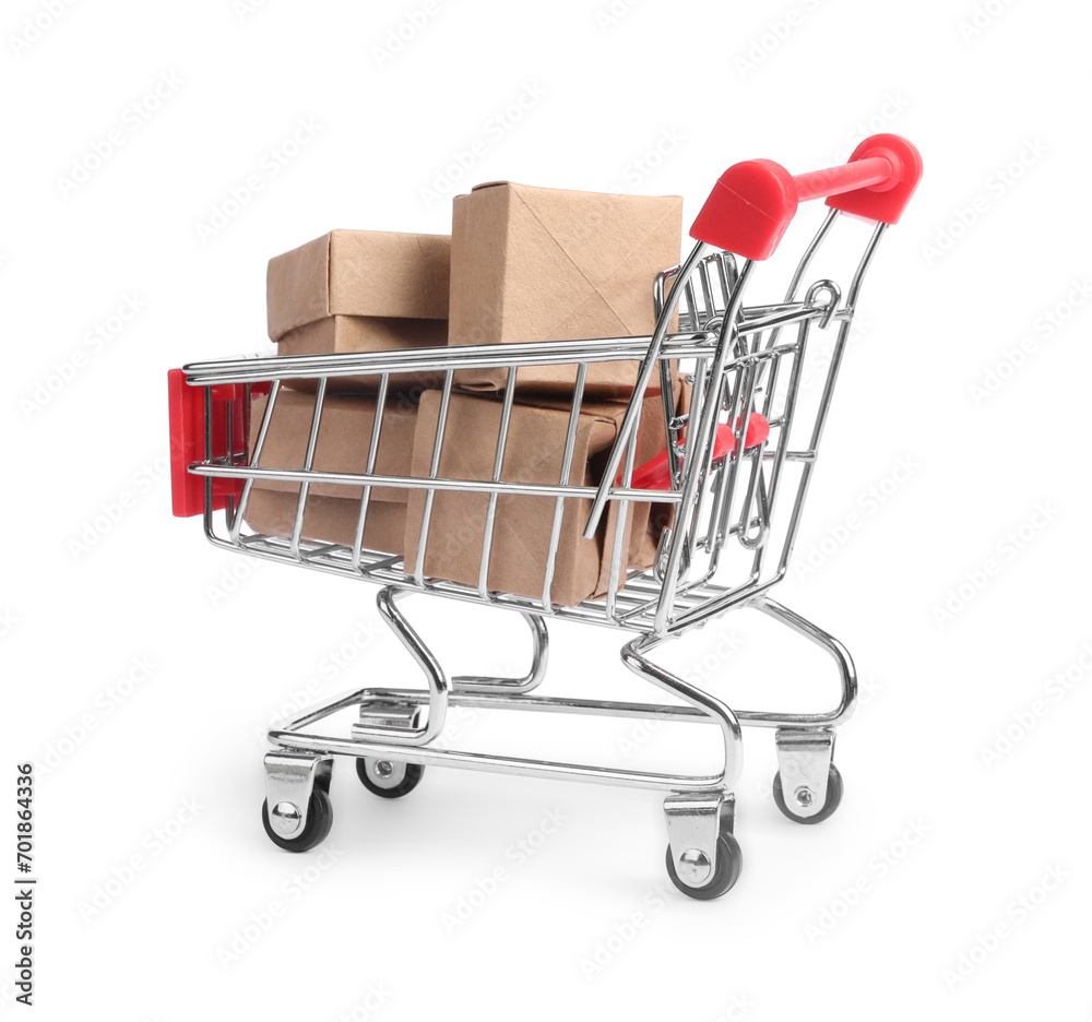 Small metal shopping cart with boxes isolated on white
