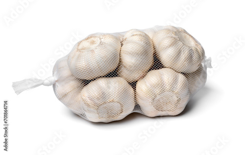 Sack with dried garlic bulbs close up isolated on white background