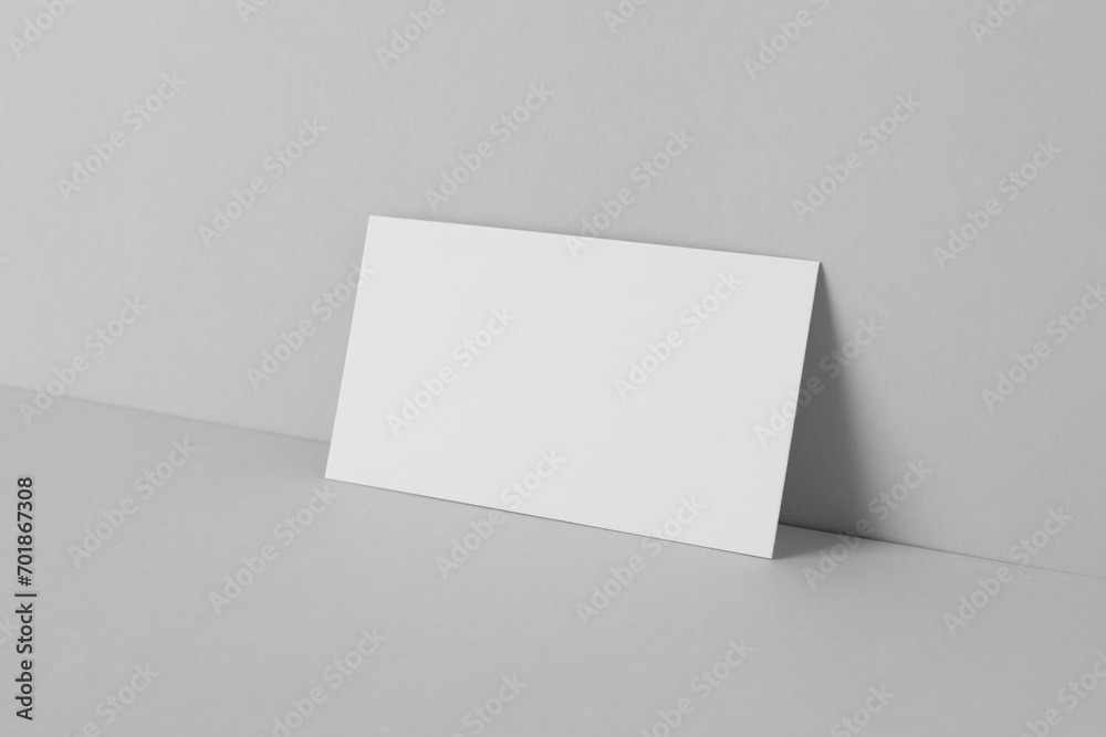 Blank business card on light grey background. Mockup for design Blank business card on light grey background. Mockup for design