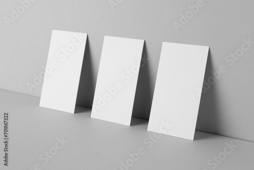 Blank business cards on light gray background. Mockup for design