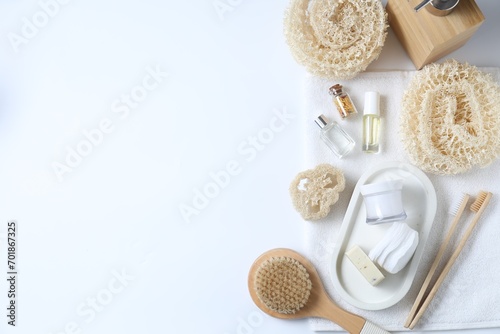 Bath accessories. Flat lay composition with personal care products on white background, space for text