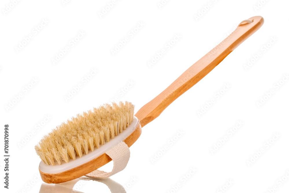 One wooden shower brush, macro, isolated on white background. One wooden shower brush, macro, isolated on white background.