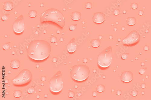 Liquid pink wet drops of gel or collagen.Spilled puddles of cosmetic serum or water. Round clean swatch of essence lotion or jelly for skin care.Beauty background with oil drops.