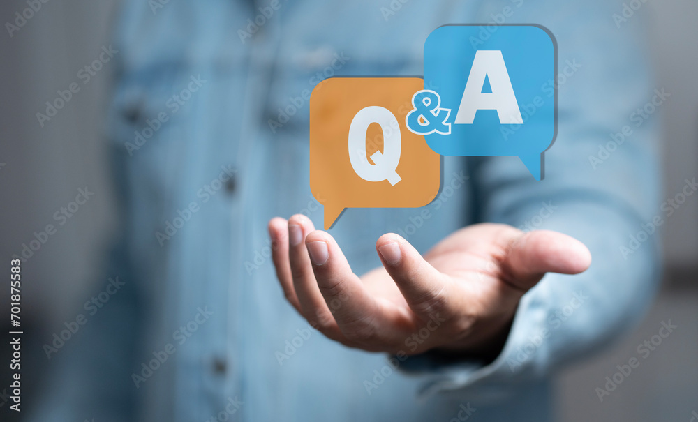 business hand clicking Q&A or Question and Answer button. Business woman holding posts in Q&A. Women answer customer questions online. Online service gives quick answers. FAQ concept, ask questions, - obrazy, fototapety, plakaty 
