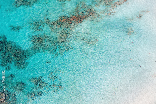 Sea background texture. Aerial drone view of people swim in Elafonisi island water, Greece. photo