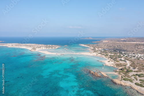 Fototapeta Naklejka Na Ścianę i Meble -  Elafonisi lagoon, Crete island Greece. Aerial drone view of turquoise water, beach with pink sand.