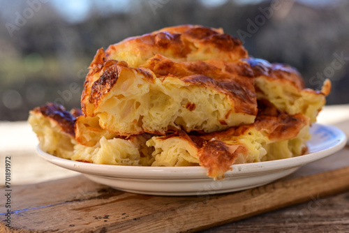 Bakery .Home made  cheese pie  with phyllo pastry and organic eggs. Bulgarian banitsa photo