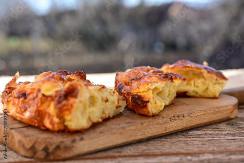 Bakery .Home made  cheese pie  with phyllo pastry and organic eggs. Bulgarian banitsa photo