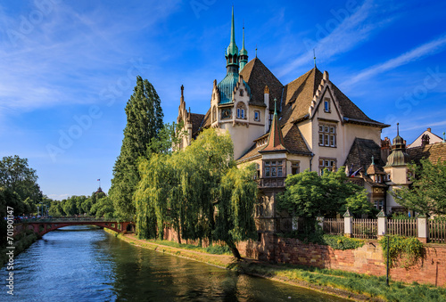 Lycee International Des Pontonniers or Pontonniers International Highschool in a half timbered house tower on Ill River in Strasbourg, Alsace, France