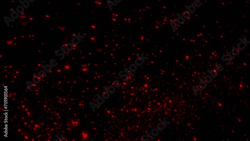 Random flying red flicker hearts on clean black background.