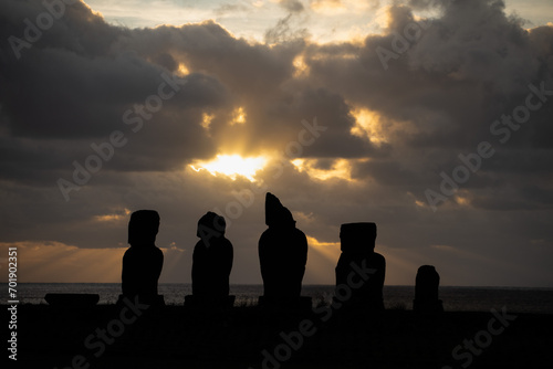 Moai statues at the sunset - Easter Island