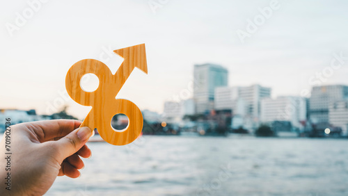 Percentage model and up arrow. Key concepts for success, methods, systems of raising or lowering Fed interest rates to correct inflation concepts.